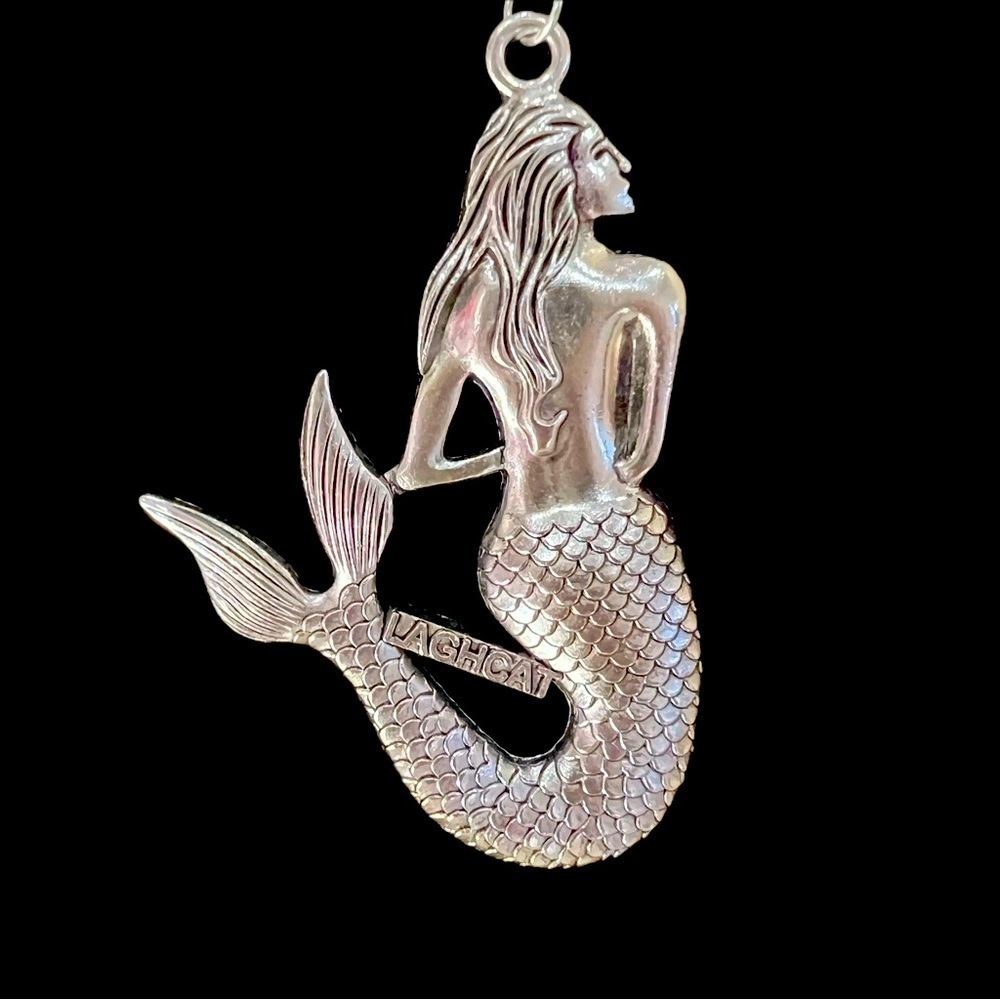 Laghcat Mermaid necklace, silver tone metal, mermaid is 2 1/4 “ infinitely chain